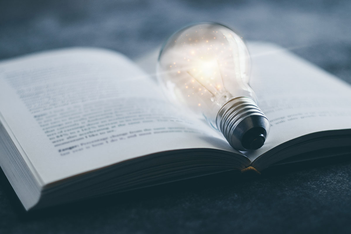 lightbulb on open book